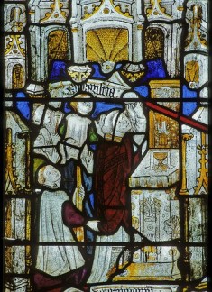 Stained glass depicting elevation of the host, Doddiscombe church